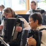 Akkordeonspieler*innen beim Konzert im Haus Wittelsbach